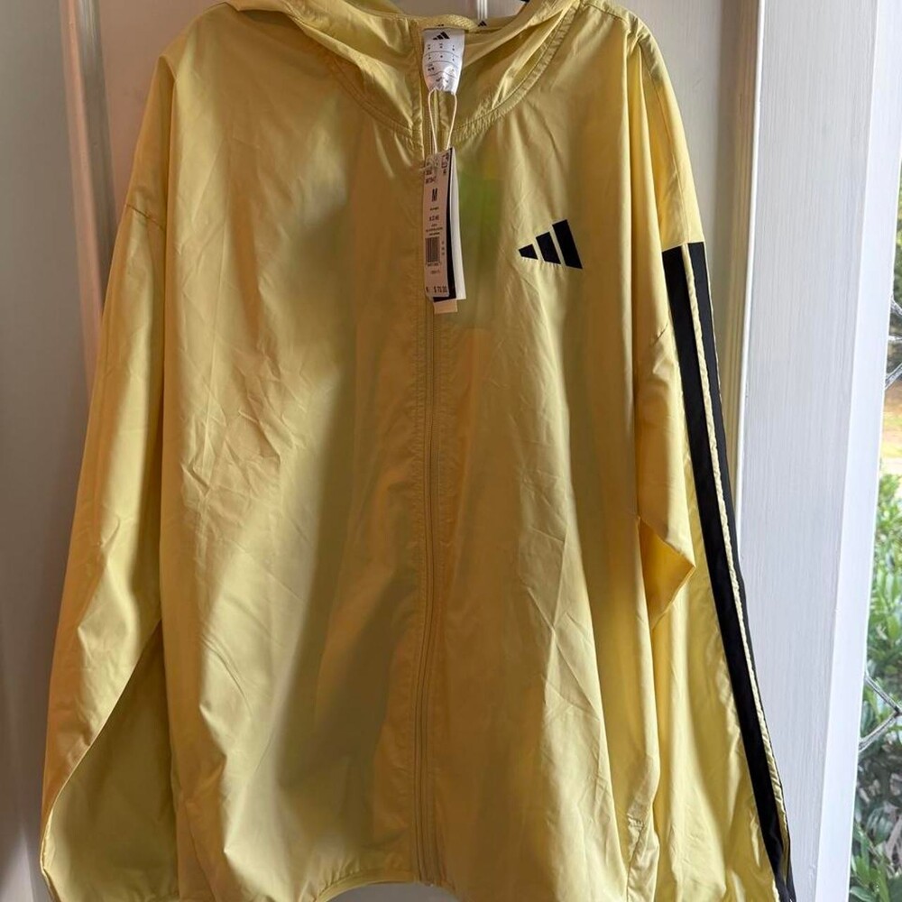 Adidas yellow windbreaker jacket with black stripes on sleeves, size M #windbrea